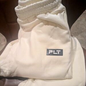 PrettyLittleThing Cream Logo Badge Detail Straight Leg Sweatpants